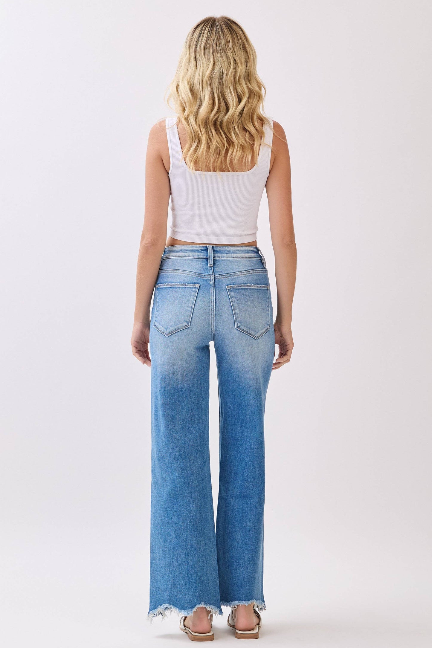 HIGH RISE STRETCH  WIDE LEG  DESTROYED HEM JEANS
